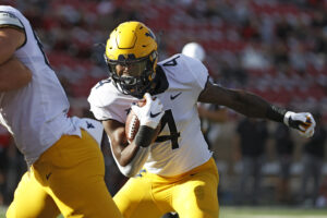 McPhearson fumble return lifts Texas Tech over West Virginia